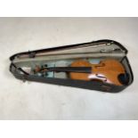 A silent violin in case also with two blows.