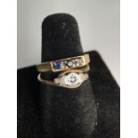 An 18ct gold and sapphire ring together with a similar 9ct example. 4g