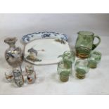 A mid century embellished jug and glasses together with a hand painted Japanese style decanter and