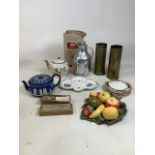 A mixed collection of ceramics and metalware to include two brass decorated shell cases, a boxed