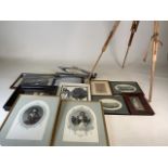 Various etchings, an easel and a music stand.