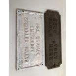 Two cast iron plaque- A Fire Brigade Emergency sign together with a warning electrical sign W:39cm