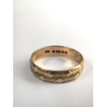 A 9ct gold wedding band. 2.0g. Size R