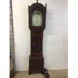 A 19th century mahogany long case clock. White painted dial with hand painted spandrels. Painted