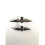 Two unmarked white metal RAF brooches.