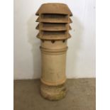 A mid height Louvre style clay chimney pot. W:36cm x D:36cm x H:90cm