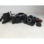 A Fujifilm FinePix S1 Pro Super CCD camera and a Kodak Professional DCs ProSLR/n with a Nikon F