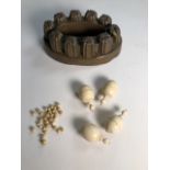 A copper lead lined jelly mould W:19cm x D:12cm x H:16.5cm together with four carved bone lace