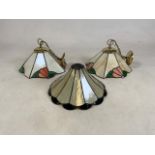 Three glass Tiffany & Co style ceiling light shades.