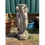 A stone bird bath or planter base of female figures. H: 68cm