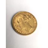 A Victorian young head gold sovereign 1880. 7.9g