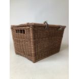 A wicker pigeon basket with two leather straps and wicker carrying handle W:52cm x D:36cm x H:33cm