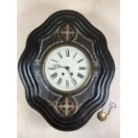 A French ebonsied boudoir clock with abalone shell and mother of pearl inlay