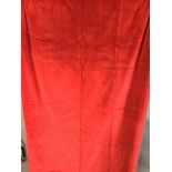 A red velvet lined door curtain
