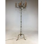 A gold metal four armed floor lamp with glass lustres and a box of spare drop lustres W:40cm x H: