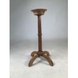 An early to mid century arts and crafts Cotswold style blonde oak stand. W:23cm x D:23cm x H:49cm