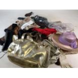 A large quantity of handbags, gloves and hats.