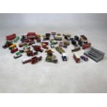 A collection of unboxed 1:43 scale model cars, wagons and public transport vehicles. To include