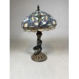 A stained glass shade with later lamp base. H:46cm