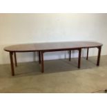 A Skovby mid century Danish extendable table with three extra leaves. W:315cm x D:110cm x H:75cm