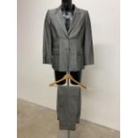 A lightweight linen two piece pinstripe suit by Lasserre Paris. 36-38