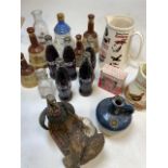 A collection empty Bells Old Scotch Whisky decanters with glass Bells decanter. Together with five