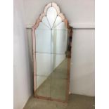 An Art Deco mirror with bronze coloured section border. W:59cm x H:152cm