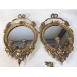 A pair of gilt and gesso decorative circular mirrors. A.F. W:37cm x H:62cm