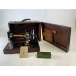 Singer Sewing machine No 28 Vibrating Sewing Machine in case with Singer tin and oil can