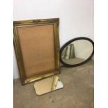 A large oval bevelled mirror, with a frameless mirror and a large frame. W:98cm x H:67cm