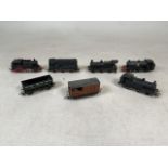 A collection of locomotive 00 gauge model trains. To include a Triang 43775 00 Gauge locomotive, a