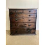 A Victorian mahogany tall boy. Two short drawers over four long with turned handles, plinth base,