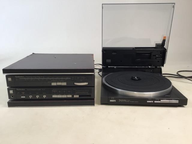 A Technics SL-3 DC Servo Automatic Turntable System record player, radio (AM/FM) and amplifier. (Not