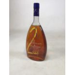 A 2000 Courvoiser Millennium cognac. 40%, 1L.