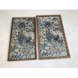 A pair vintage of Japanese Embroidered sleeve panels in frames W:21.5cm x H:35cm framed dimensions