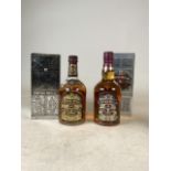 Two bottles of Chivas Regal 12 year old scotch whisky with original packaging. Left: H:22cm.