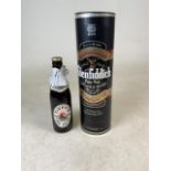 A 1 litre bottle of Glenfiddich pure malt scotch whiskey in original packaging together with