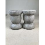Two concrete plinths or candle stands. W:15cm x D:15cm x H:20cm