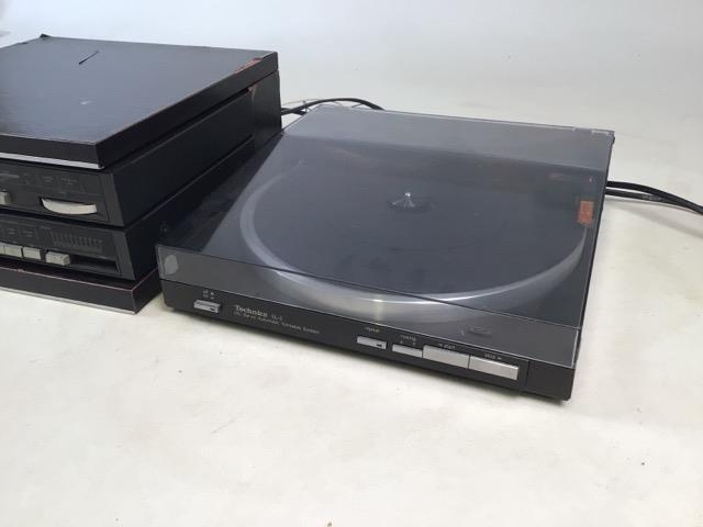 A Technics SL-3 DC Servo Automatic Turntable System record player, radio (AM/FM) and amplifier. (Not - Image 4 of 4