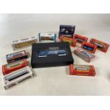 A collection of boxed 00 gauge trains to include Bachman Spectrum dash 8-40 locomotive, a Ho 40