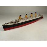 A Minicraft 1/350 scale model of the RMS Titanic. Some damage to the flag poles and cables.