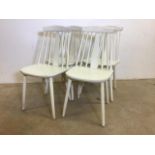 A set of four Ercol style mid century chairs painted white. Seat height H:43cm