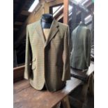 Two checked wool jacket by Bladen. 43.