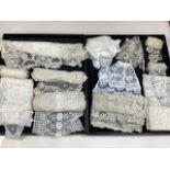 A collection of vintage and nineteenth century lace items to include trims, cuffs, collar and others