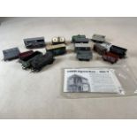 A collection of 00 gauge tankers and wagons plus an unbuilt LNER signal box. Wagons/tankers