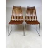 A pair of Hans Brattrud, Scandia, bentwood chairs, for Hove Mobler, rosewood on steel, circa 1960,