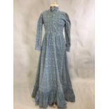 An early 1970s Victorian style Laura Ashley dress in printed needle cord with high neck and