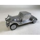 Vintage cast aluminium car. W:28cm x D:15cm x H:10cm