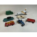 A collection of 1:43 scale model cars by Corgi, Dinky and Matchbox plus a Corgi Space Shuttle. Dinky