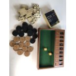 A vintage Shut the Box game together with a set of Bakelite Draughts and two sets of dominoes W:29cm